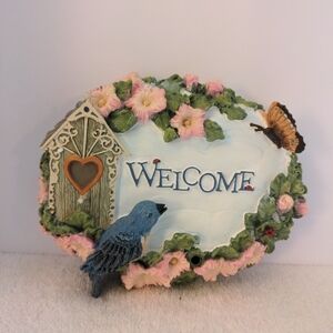 Avon Welcome Sign with Blue, Green, and Pink Accents